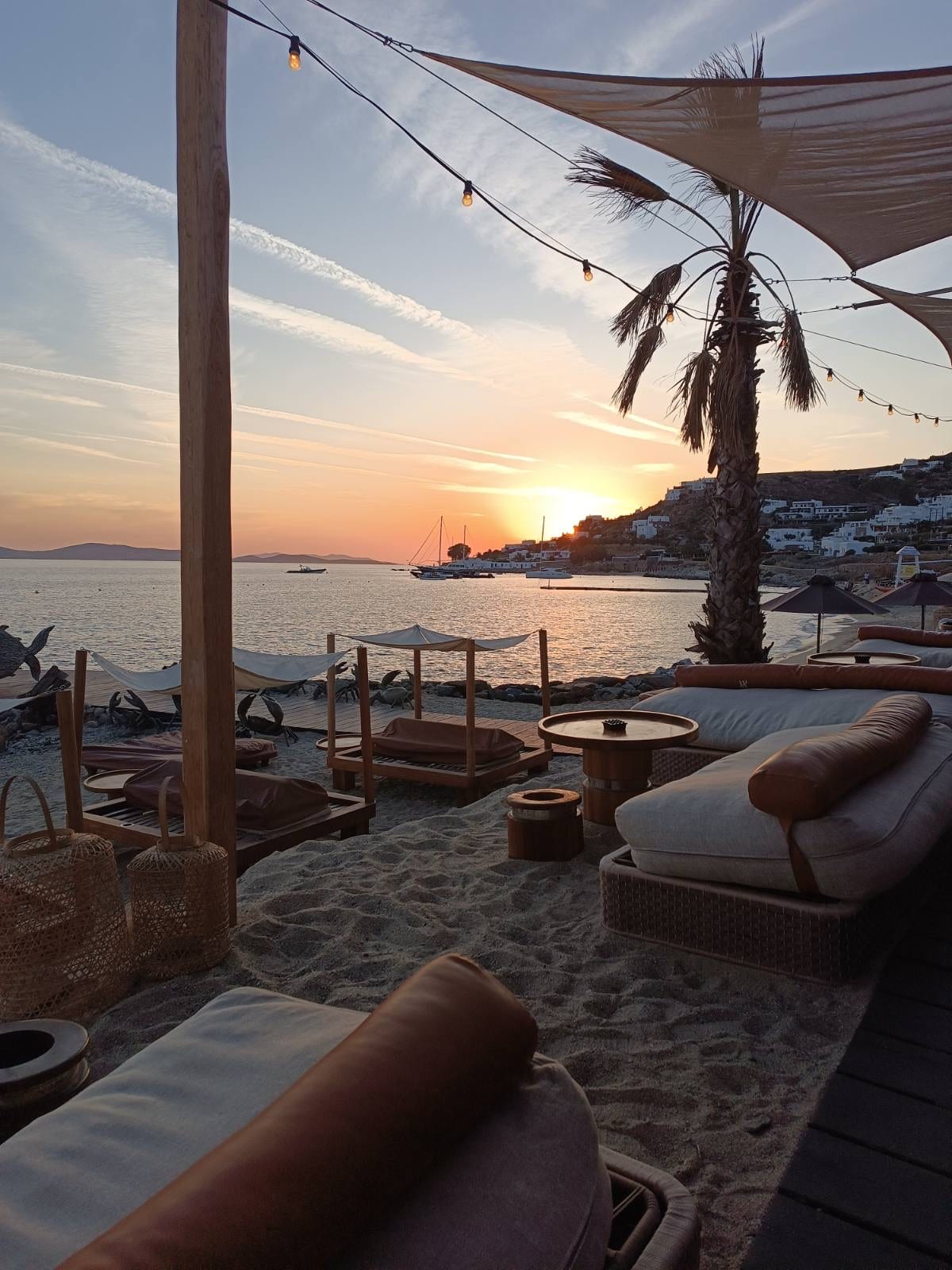 Golden-hour beach lounge on Agios Ioannis in Mykonos